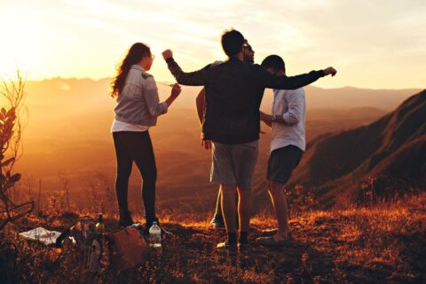 A photo of four people having fun and enjoying a hiking trip to Mount Helena. Intended as a representation of eudaimonia.