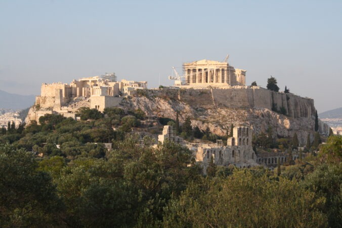 A photo of the modern ruins of the Acropolis of Athens, designed to represent sortition as a form of government.
